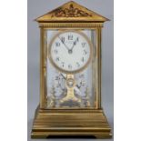 Eureka. A brass four glass electric mantel timepiece, No 7983, c1910, in architectural style case