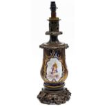 A French oxodised brass mounted cobalt ground porcelain oil lamp, c1870, the Sevres style, the