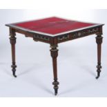 A French gilt brass mounted, ivory inlaid and penwork decorated amboyna and ebony card table, c1870,