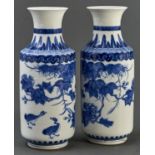 A pair of Chinese blue and white cylindrical vases, with waisted neck, decorated with geese and