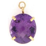 A cushion shaped amethyst pendant, in gold, 17 x 20mm, 7.6g Good condition