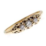 A three stone diamond ring, in gold marked PLAT 18ct, 3.3g, size V Good condition