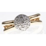 A diamond cluster ring, in gold marked 585, 5.4g, size M Good condition