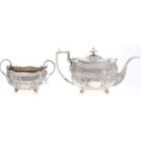A Scottish George III silver teapot and sugar bowl, with gadrooned rim, angular or leaf form