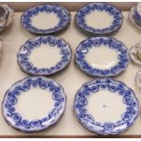 A set of twenty four Grindley & Co flow blue Haddon pattern dinner plates, c1900, scalloped gilt