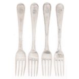 A set of four Irish George III silver table forks, Old English Thread pattern, crested, by Michael