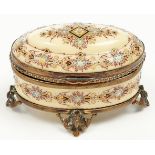 A miniature oval Palais Royale brass mounted yellow enamel trinket box, late 19th c, lined in