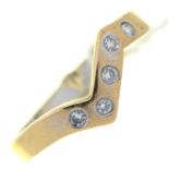 A diamond dart ring, in white gold marked 18k, 4.8g, size R Good condition