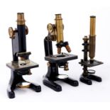 A brass and black painted metal  compound microscope, R & J Beck London, No 4136, model 22, early