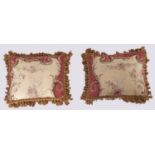 A pair of Aubusson tapestry faced cushions, the tapestry circa late 19th c, in Louis XV style,