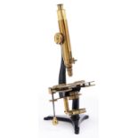 A brass and black painted steel compound microscope, Powell & Lealand London, late 19th c, the