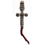 A George III silver  baby's rattle,  hung with bells and chased with foliage, coral tether, 16cm