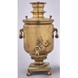 A brass samovar, 19th / early 20th c, with wood insulated hinged handles, 51cm h Minor dents and
