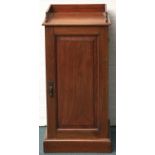 A Victorian walnut pot cupboard, with galleried top and panelled door, 85cm h; 33 x 39cm Good