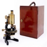 A brass and black painted steel compound microscope, W Watson & Sons Limited, No 40228,  ?Patna?,