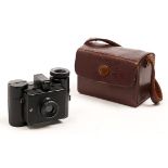 A Sida black painted cast metal sub miniature roll film camera, c1936, with F8 35mm meniscus lens,