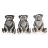 One and a pair of Edwardian silver teddy bear novelty pepperettes, 36mm h, by Marks & Cohen and