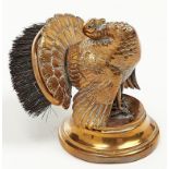 Writing Antiques. A Victorian brass turkey novelty nib brush, on weighted capstan base, 80mm h,