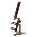 A brass compound microscope, the limb with compass joint and focusing by rack work, slightly