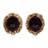 A pair of Victorian foiled garnet ear studs, in gold, adapted from another article, 3.4g Light