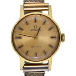 An Omega gold plated lady's wristwatch, 21mm, on an expanding bracelet Hands setting but not