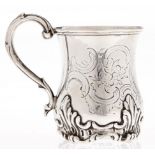 A Victorian silver christening mug, of waisted form, engraved with C-scrolls and flowers, 95mm h, by