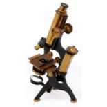 A brass compound microscope, Joseph Long London, late 19th c, the limb on trunnions with fine