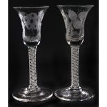 Two English wine glasses, c1770, the bell bowl engraved with single inverted jacobite rose emblem on