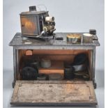 A hand wound japanned tinplate 35mm Kinematograph or similar film projector, c1920 and several
