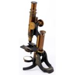 A brass compound microscope, Negretti & Zambra London, late 19th c, the limb on trunnions with