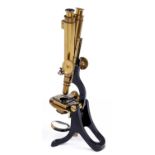 A brass compound binocular microscope, Henry Crouch London No 1179 "Premier", c1880, focusing by