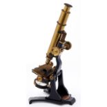 A brass and black painted steel compound microscope, J Parkes & Son 5 St Marys Row Birmingham,
