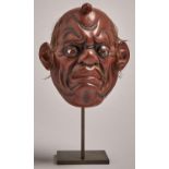 An unusual Japanese lacquer mask of Tengu, late Edo or Meiji period, applied with human hair and