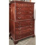 A George III mahogany chest on chest, c1800, dentil moulded cornice above three short drawers, three