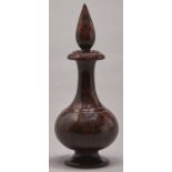 A Victorian turned serpentine bottle and stopper, Cornwall, late 19th c, of baluster form with
