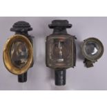 Two Victorian black japanned carriage lamps, brass mounts, re-painted, lacks shaft, adapted for