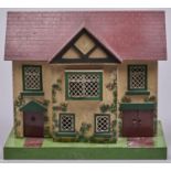 A painted wood doll's house, second quarter 20th c, 47cm h and a quantity of contemporary