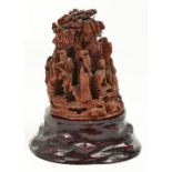 A Chinese bamboo carving of immortals amidst trees, 10cm h, wood stand Good condition - no