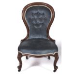 A Victorian mahogany nursing chair, c1870, with moulded frame, the button back and stuffed over