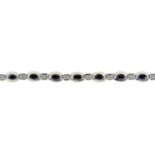 A sapphire and diamond bracelet, in 9ct white gold 16.5g Good condition