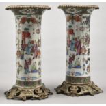 A pair of Canton famille rose cylindrical vases with Louis XV style giltmetal mounts, 19th c, 30cm h