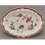 A Bow Kakiemon dish or stand, c1760,  enamelled with the Quail pattern, 18.5cm Firing crack at 12