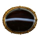 A Victorian bande4d  agate  brooch,  in gold, adapted from another article, 3.5g Good condition