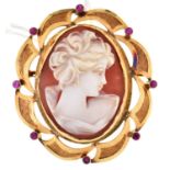 A cameo brooch, in ruby set gold mount with gold back, indistinct control mark, 6.6g