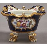 A Coalport blue ground pot pourri vase, c1820, the poorly defined scale pattern ground reserved with