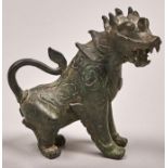 A Chinese bronze sculpture of a mythical beast, greenish dark patina, 14cm h Casting flaws