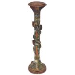 Folk Art. A French polychrome wood torchere, circa early 20th c, in the form of a glass eyed snake