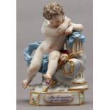 A Meissen figure of Cupid resting after conquering a heart, c1900, originally modelled by Michel