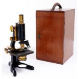 A brass and black painted metal compound microscope, W Watson & Sons Ltd London,   No 46730, "