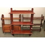 A Victorian mahogany three tier hanging wall shelf, with turned pillars, 86cm h; 60cm w and two